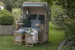 Strandkorb Amrum Teak PE Shell Dessin 504 -Schemel Shop 01404 strandkorb amrum teak bullauge shell 504 milieu