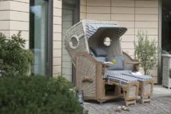 Strandkorb Amrum Teak PE Shell Dessin 545 -Schemel Shop 01424 strandkorb amrum teak bullauge shell 545 milieu 3